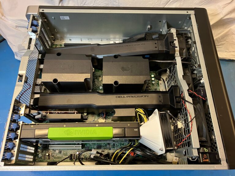 Dell Precision T7910 with the side panel removed, showing the two CPU shrouds and an NVIDIA Tesla K80 card in the expansion slots